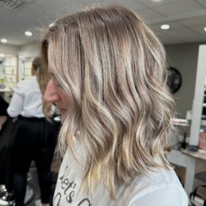 blonde white tshirt haircut