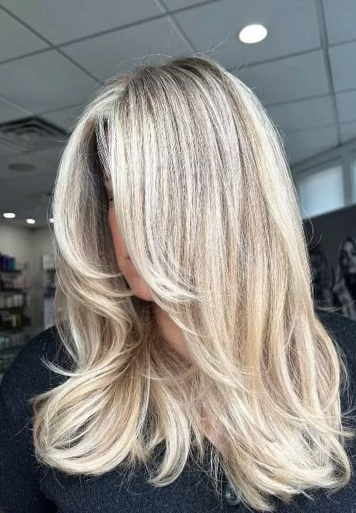 Hair coloring service displayed at Elavína Salon and Spa in Manchester, NH